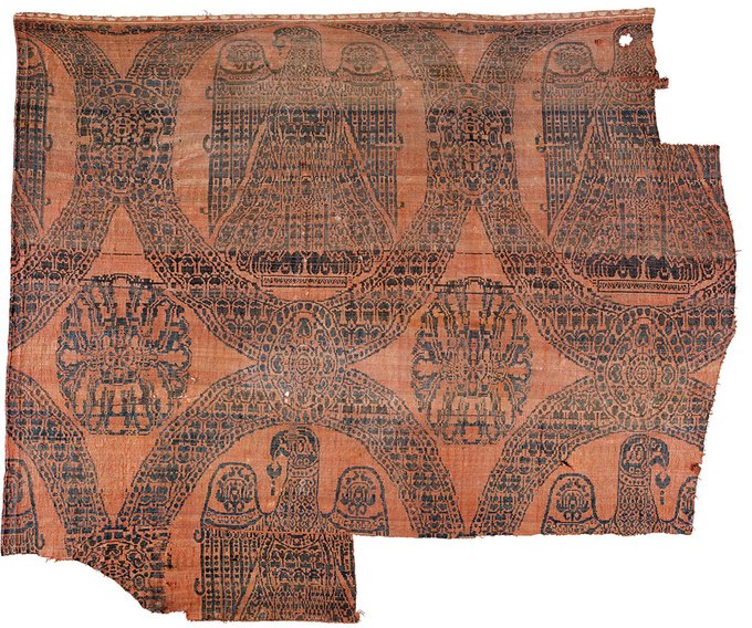 Purpurfarvet byzantinsk tæppe af silke og med ørnemotiver